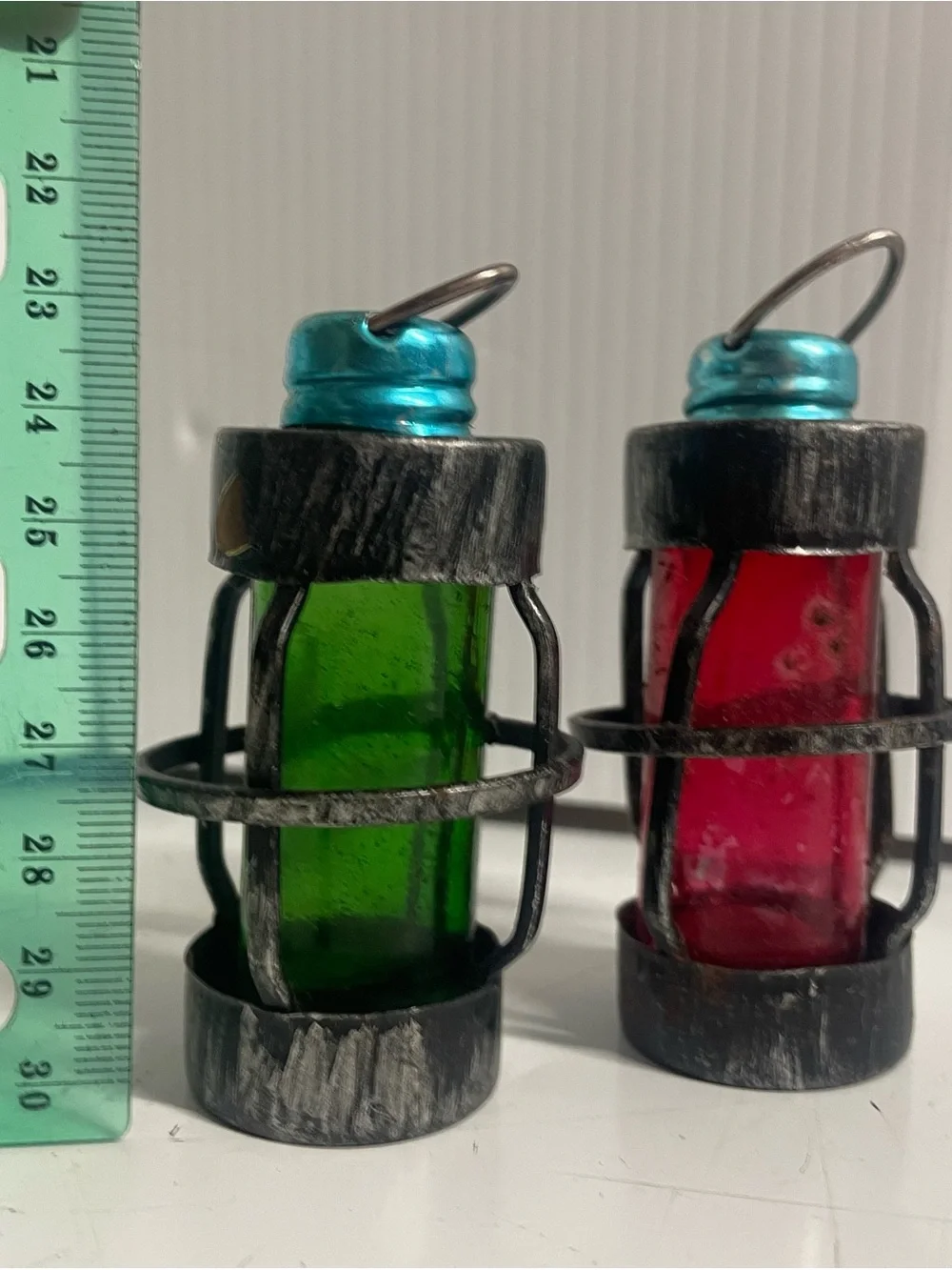 2 sets of salt and pepper shakers look like lanterns
